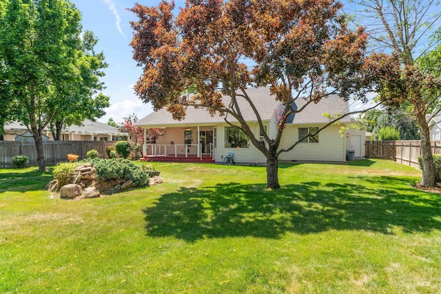 1728 S Labrador Pl, Meridian, ID 83642 - rear view of property with a fenced backyard and a shed