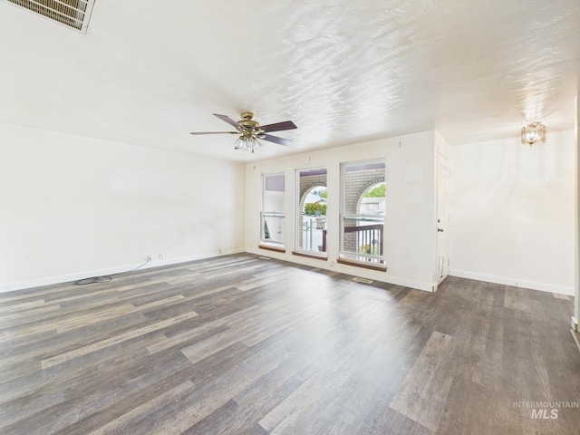 1409 Blane, Emmett, ID 83617 - unfurnished living room with ceiling fan, wood finished floors, and baseboards