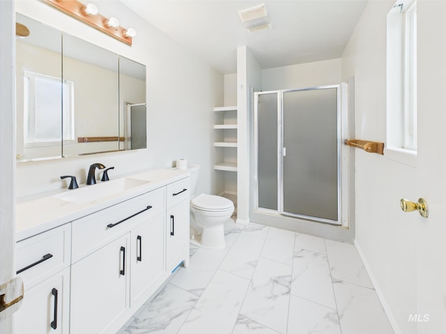 1409 Blane, Emmett, ID 83617 - bathroom featuring vanity, toilet, a shower stall, marble look tile flooring, and baseboards