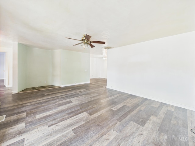 1409 Blane, Emmett, ID 83617 - spare room featuring ceiling fan, wood finished floors, and baseboards