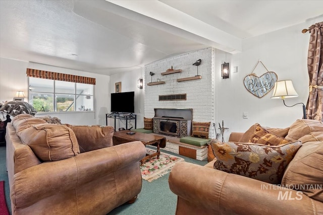 living room with a brick fireplace and visible vents