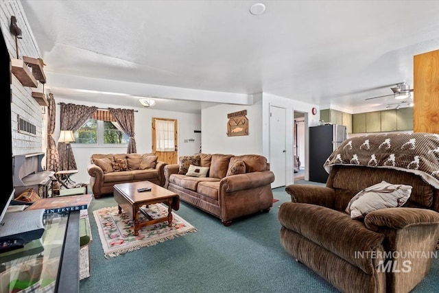 living area featuring carpet floors, ceiling fan, and visible vents