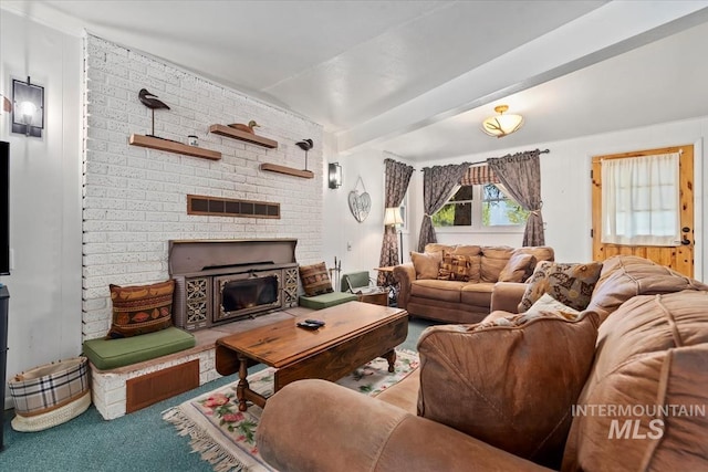 living area featuring visible vents, a fireplace, beam ceiling, and carpet