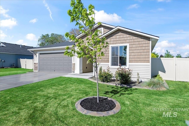 view of front of property with concrete driveway and an attached garage