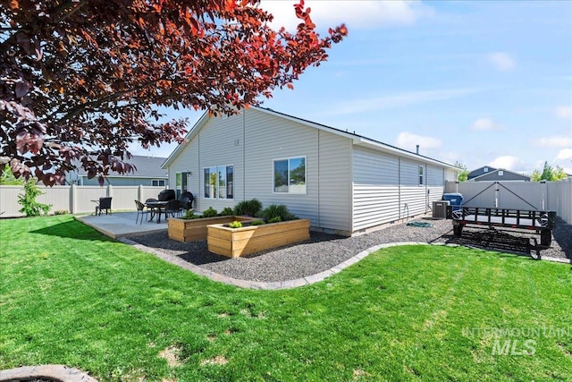 back of house with a patio and central AC unit
