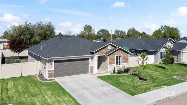 view of front of house featuring a garage, stone siding, and driveway