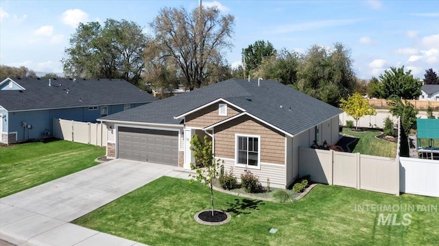 ranch-style house featuring an attached garage and driveway