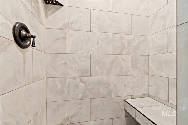 bathroom view of tiled shower