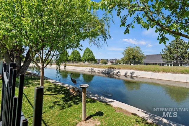 water view featuring fence