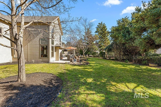 view of yard with a patio area and fence