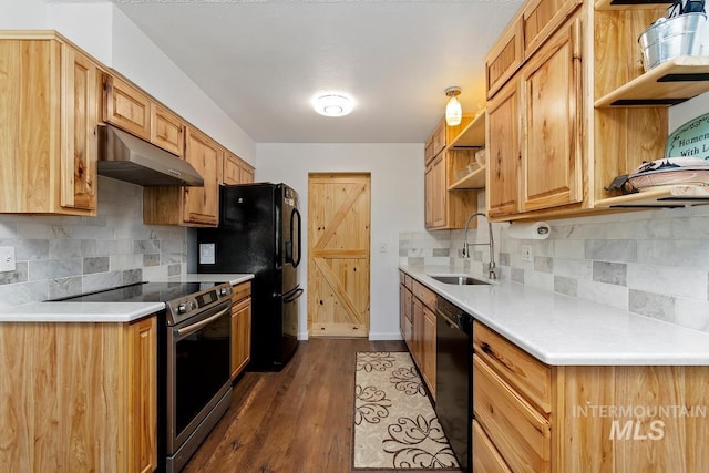 12456 S Lonnie Ln, Kuna, ID 83634 - kitchen with under cabinet range hood, black appliances, open shelves, a sink, and dark wood finished floors