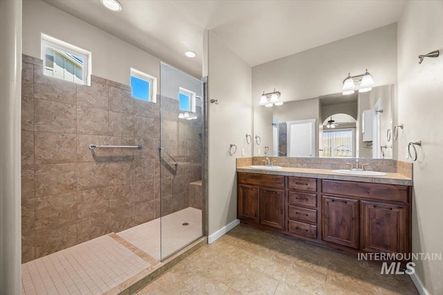 18555 N Goldenridge Pl, Boise, ID 83714 - bathroom featuring a sink, a walk in shower, and double vanity