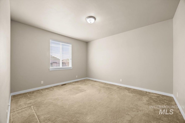 18555 N Goldenridge Pl, Boise, ID 83714 - carpeted spare room with baseboards