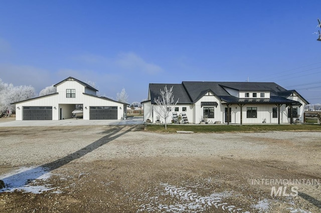 modern farmhouse style home featuring a garage