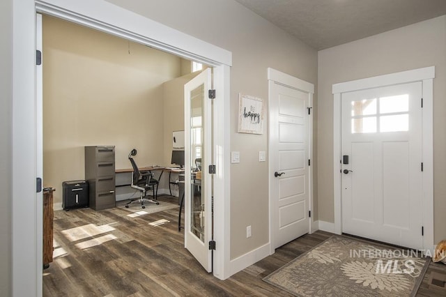 foyer featuring dark hardwood / wood-style flooring