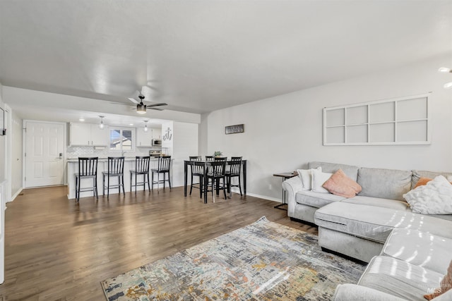 275 Elaine Ave Unit 2, Twin Falls, ID 83301 - living room featuring ceiling fan, wood finished floors, and baseboards