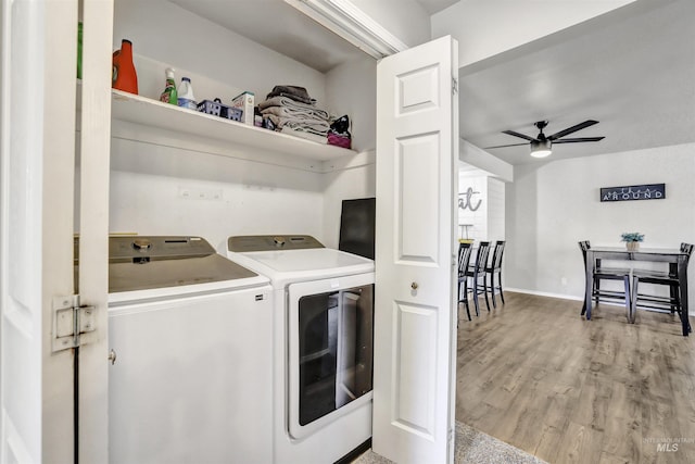 275 Elaine Ave Unit 2, Twin Falls, ID 83301 - laundry area featuring washing machine and dryer, ceiling fan, light wood-style floors, and baseboards