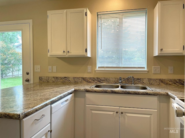 228 W Winnipeg St, Meridian, ID 83642 - kitchen with dishwasher, a sink, white cabinets, range, and a peninsula
