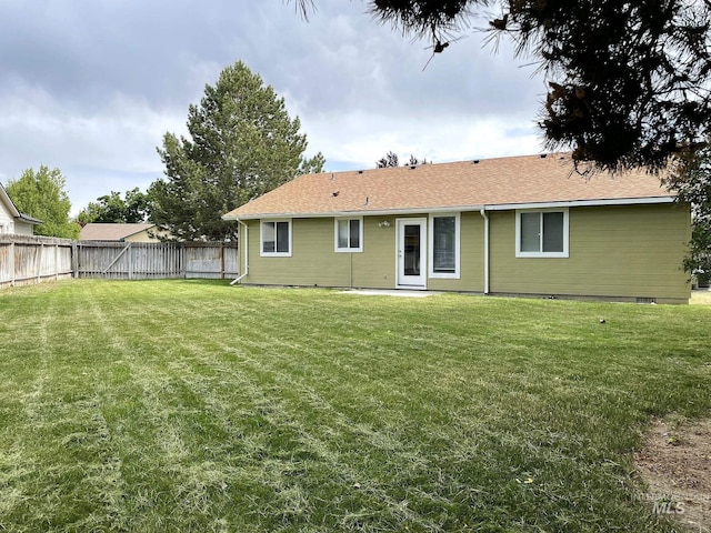 228 W Winnipeg St, Meridian, ID 83642 - rear view of property featuring a shingled roof
