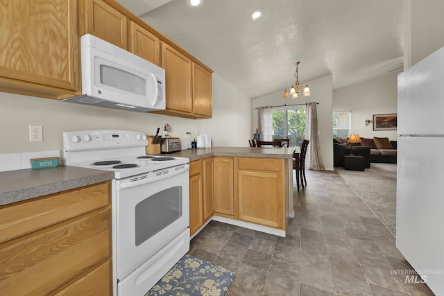 3719 E Sandyford Ave, Nampa, ID 83686 - kitchen featuring white appliances, vaulted ceiling, a chandelier, a peninsula, and recessed lighting