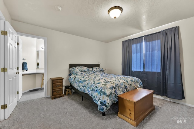 3719 E Sandyford Ave, Nampa, ID 83686 - carpeted bedroom with a textured ceiling and ensuite bath