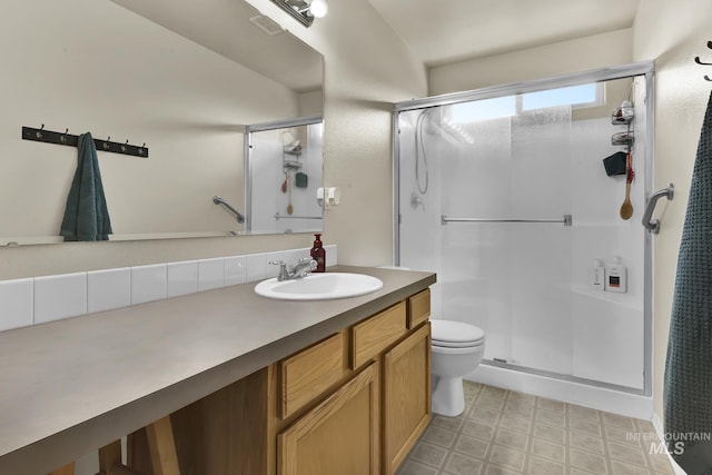3719 E Sandyford Ave, Nampa, ID 83686 - full bathroom with a shower stall, vanity, and tile patterned floors