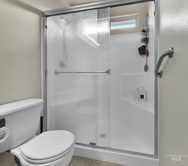 3719 E Sandyford Ave, Nampa, ID 83686 - full bathroom featuring toilet and a stall shower