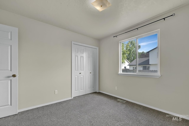 3719 E Sandyford Ave, Nampa, ID 83686 - unfurnished bedroom with carpet flooring and a closet