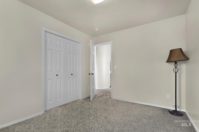 3719 E Sandyford Ave, Nampa, ID 83686 - unfurnished bedroom with carpet floors and a closet