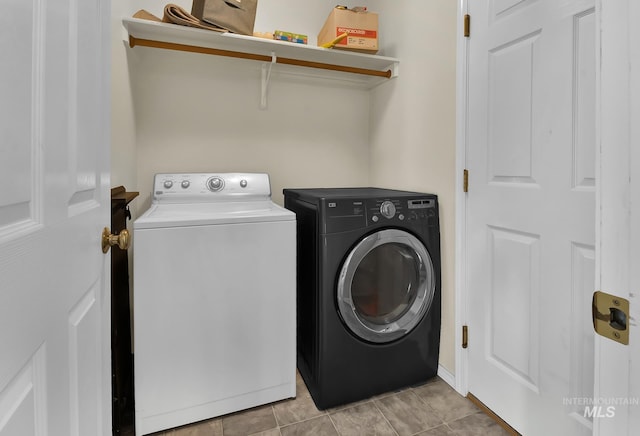3719 E Sandyford Ave, Nampa, ID 83686 - laundry room featuring washing machine and dryer and light tile patterned floors