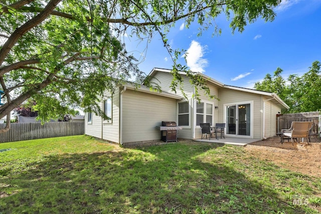 3719 E Sandyford Ave, Nampa, ID 83686 - back of property with a fenced backyard and a patio area