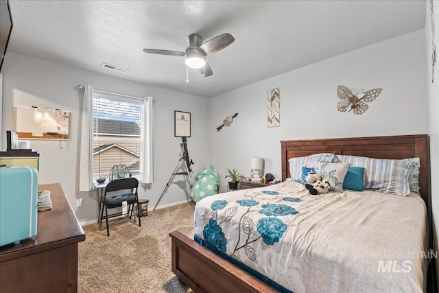 1430 NE Quigley St, Mountain Home, ID 83647 - carpeted bedroom featuring visible vents, baseboards, and a ceiling fan