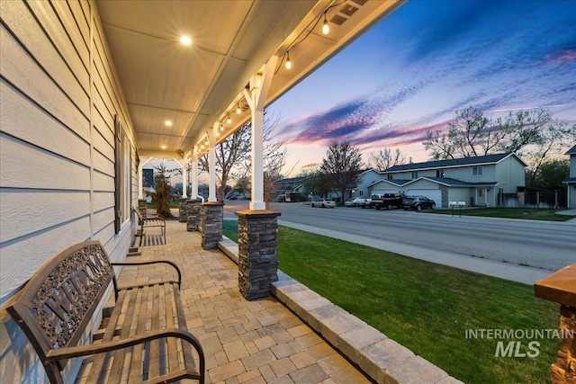 1430 NE Quigley St, Mountain Home, ID 83647 - view of patio / terrace with a residential view