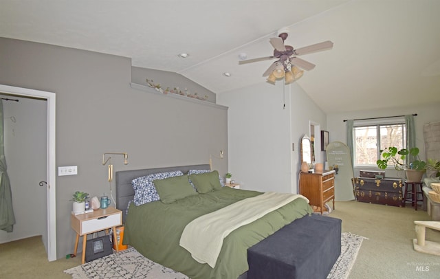 bedroom featuring carpet floors, a ceiling fan, and vaulted ceiling