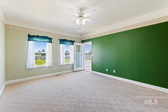 25090 The Driving Ln, Caldwell, ID 83607 - empty room featuring carpet flooring and a ceiling fan