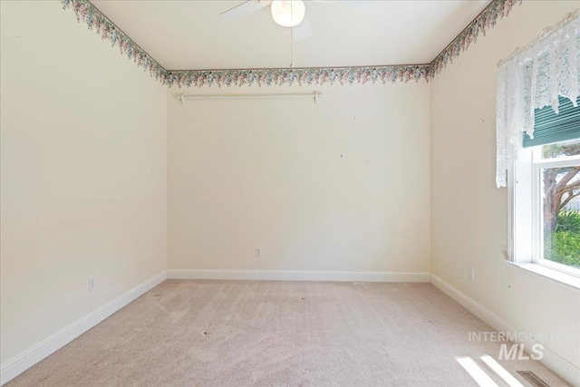 25090 The Driving Ln, Caldwell, ID 83607 - empty room with light colored carpet and a ceiling fan