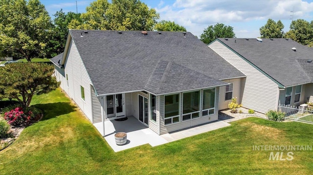 25090 The Driving Ln, Caldwell, ID 83607 - back of house featuring roof with shingles and a patio