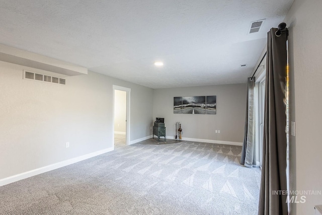 interior space with a textured ceiling