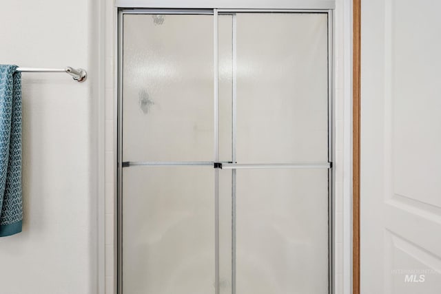 1320 American Ln, Emmett, ID 83617 - full bathroom featuring a shower with shower door