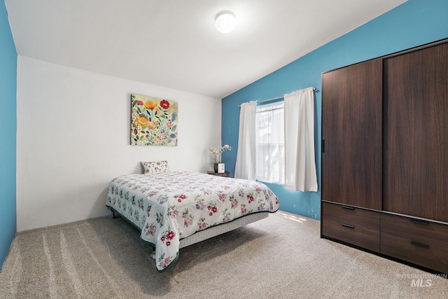 1320 American Ln, Emmett, ID 83617 - bedroom featuring lofted ceiling and carpet flooring