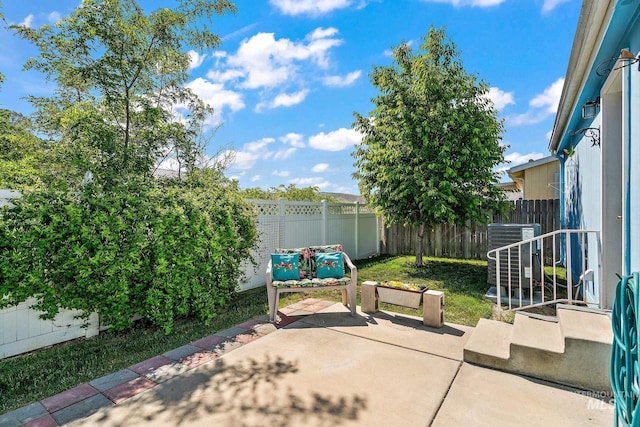 1320 American Ln, Emmett, ID 83617 - fenced backyard with central AC unit and a patio