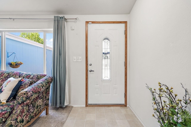 1320 American Ln, Emmett, ID 83617 - entrance foyer featuring healthy amount of natural light, light tile patterned flooring, and baseboards