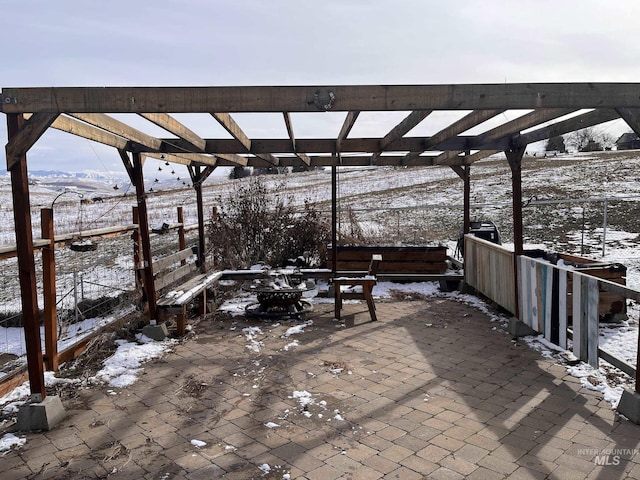 view of snow covered patio