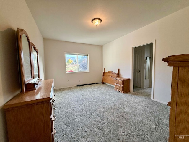 bedroom featuring light colored carpet