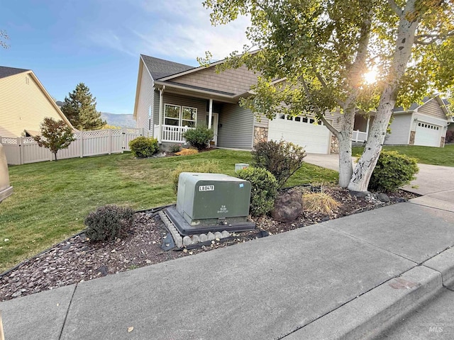 ranch-style home featuring a front yard and a garage