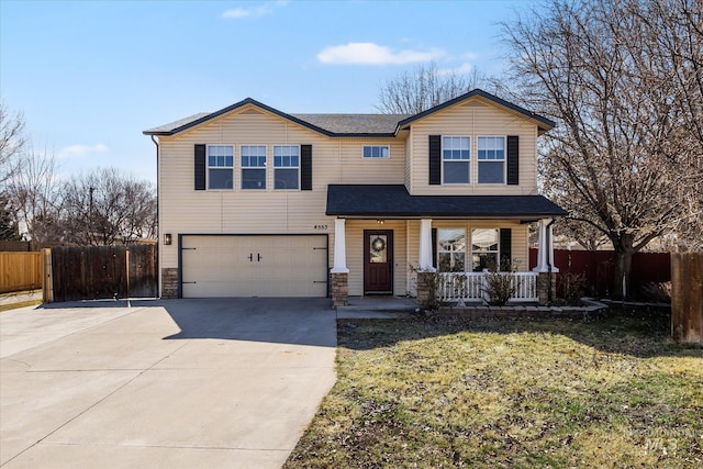 view of front of property with a front lawn, fence, a porch, a garage, and driveway