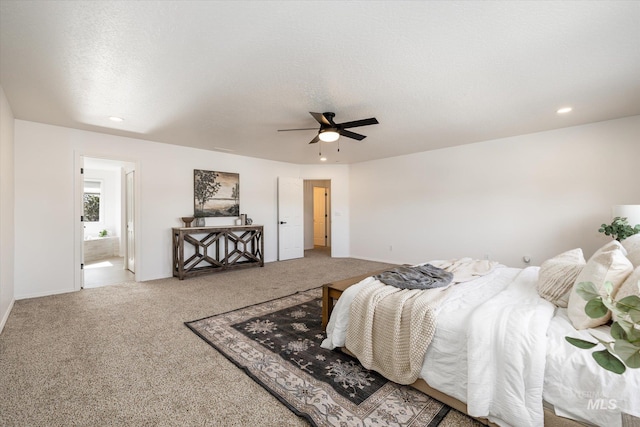 carpeted bedroom with recessed lighting, baseboards, a textured ceiling, and a ceiling fan