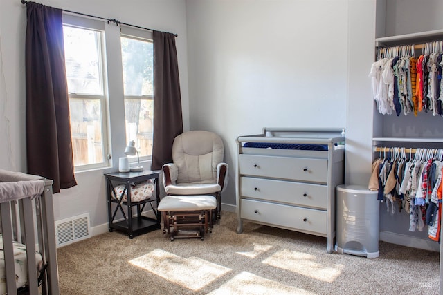 bedroom with carpet, visible vents, and baseboards