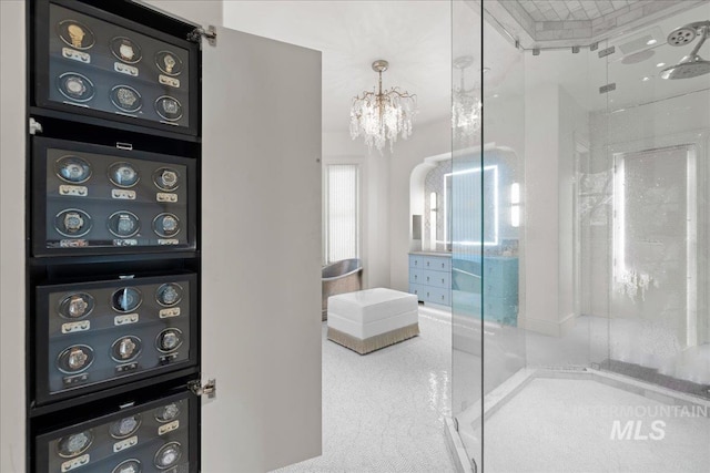 1122 W Two Rivers Ln, Eagle, ID 83616 - full bath featuring a shower with shower door and a chandelier