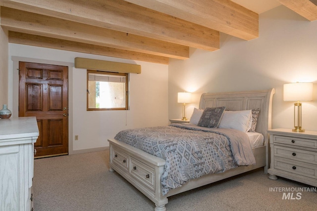 351 S 2nd Ave Unit 602, Ketchum, ID 83340 - bedroom featuring light colored carpet and beam ceiling